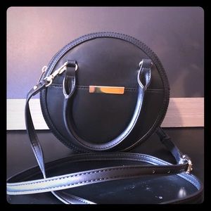 A New Day black round shaped handbag